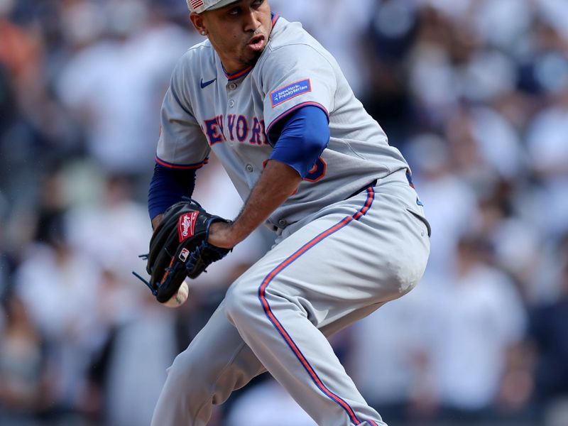 May 17, 2025; Bronx, New York, USA; New York Mets relief pitcher Edwin Diaz (39) pitches against the New York Yankees during the ninth inning at Yankee Stadium. Mandatory Credit: Brad Penner-Imagn Images