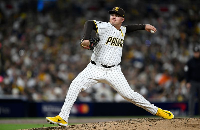 Oct 9, 2024; San Diego, California, USA; San Diego Padres pitcher Adrian Morejon (50) throws in the third inning against the Los Angeles Dodgers during game four of the NLDS for the 2024 MLB Playoffs at Petco Park.  Mandatory Credit: Denis Poroy-Imagn Images