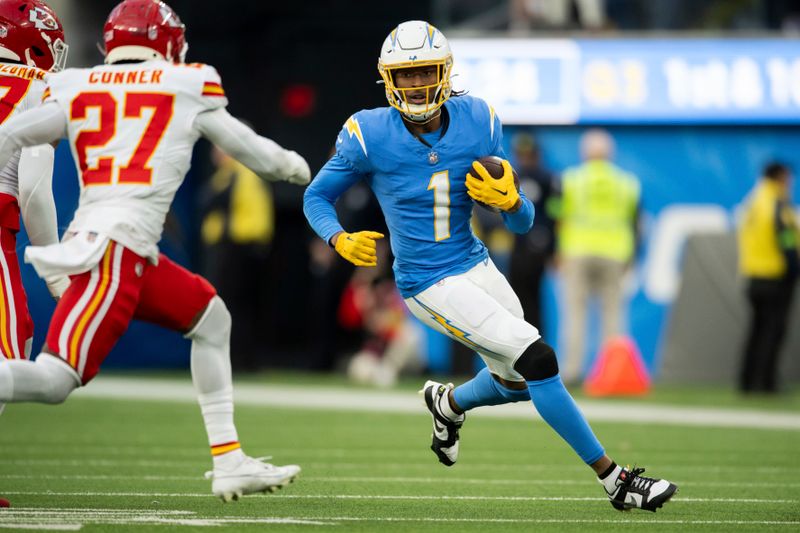 Los Angeles Chargers wide receiver Quentin Johnston (1) runs with the ball during an NFL football game against the Kansas City Chiefs, Sunday, Jan. 7, 2024, in Inglewood, Calif. (AP Photo/Kyusung Gong)