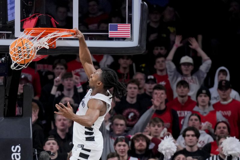 Jan 16, 2024; Cincinnati, Ohio, USA;  Cincinnati Bearcats guard Day Day Thomas (1) dunks the ball against the TCU Horned Frogs in the second half at Fifth Third Arena. Mandatory Credit: Aaron Doster-USA TODAY Sports