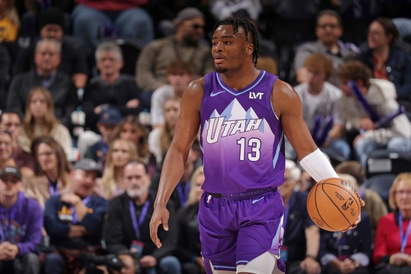 SALT LAKE CITY, UT - NOVEMBER 14: Isaiah Collier #13 of the Utah Jazz dribbles the ball during the game against the Dallas Mavericks on November 14, 2024 at Delta Center in Salt Lake City, Utah. NOTE TO USER: User expressly acknowledges and agrees that, by downloading and or using this Photograph, User is consenting to the terms and conditions of the Getty Images License Agreement. Mandatory Copyright Notice: Copyright 2024 NBAE (Photo by Melissa Majchrzak/NBAE via Getty Images)