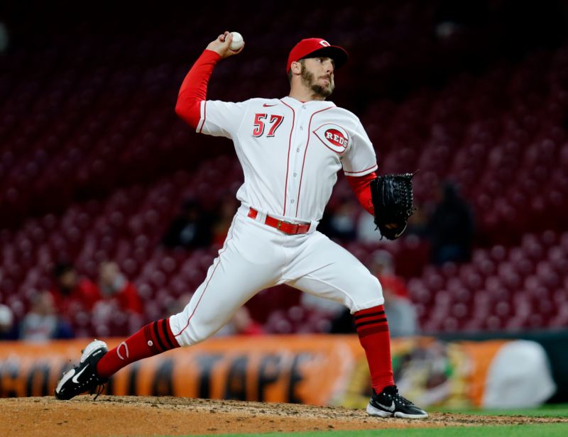 Apr 17, 2023; Cincinnati, Ohio, USA; Cincinnati Reds relief pitcher Kevin Hereto (57) throws against the Tampa Bay Rays during the ninth inning at Great American Ball Park. Mandatory Credit: David Kohl-USA TODAY Sports