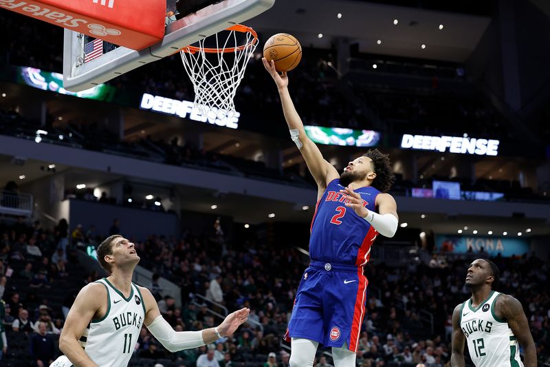 MILWAUKEE, WISCONSIN - NOVEMBER 13: Cade Cunningham #2 of the Detroit Pistons scores during the second half against the Milwaukee Bucks at Fiserv Forum on November 13, 2024 in Milwaukee, Wisconsin. NOTE TO USER: User expressly acknowledges and agrees that, by downloading and or using this photograph, User is consenting to the terms and conditions of the Getty Images License Agreement. (Photo by John Fisher/Getty Images)