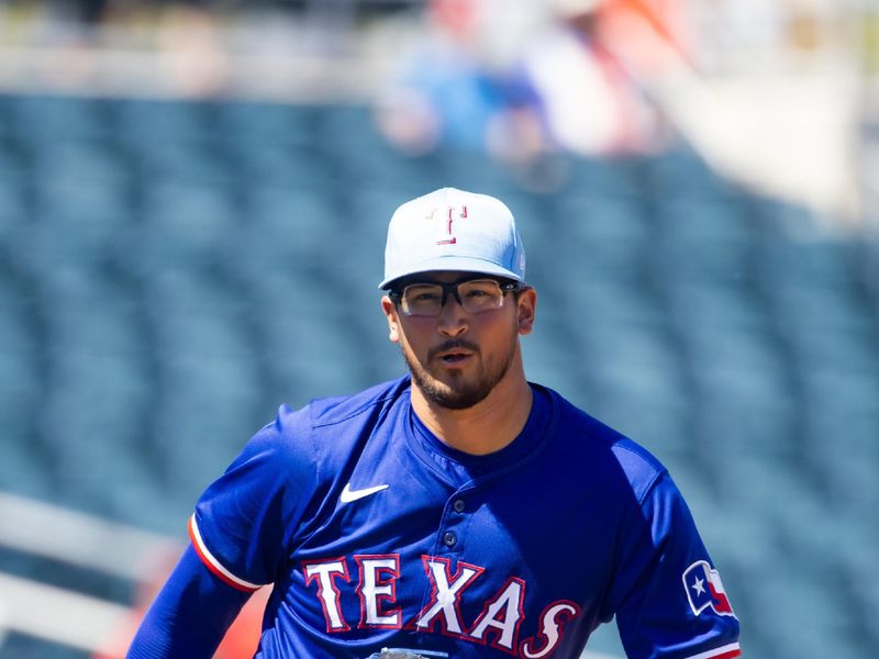 Mar 20, 2024; Goodyear, Arizona, USA; Texas Rangers pitcher Dane Dunning against the Cincinnati Reds during a spring training baseball game at Goodyear Ballpark. Mandatory Credit: Mark J. Rebilas-USA TODAY Sports