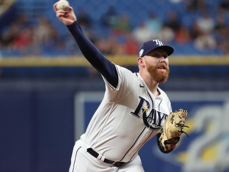 Aug 10, 2023; St. Petersburg, Florida, USA;  Tampa Bay Rays starting pitcher Zack Littell (52) throws a pitch during the first inning against the St. Louis Cardinals at Tropicana Field. Mandatory Credit: Kim Klement Neitzel-USA TODAY Sports