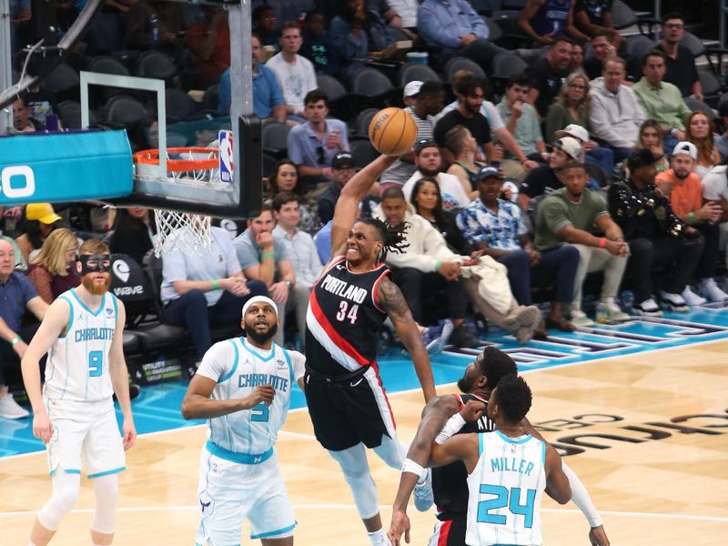 CHARLOTTE, NC - APRIL 3: Jabari Walker #34 of the Portland Trail Blazers goes to the basket during the game on April 3, 2024 at Spectrum Center in Charlotte, North Carolina. NOTE TO USER: User expressly acknowledges and agrees that, by downloading and or using this photograph, User is consenting to the terms and conditions of the Getty Images License Agreement. Mandatory Copyright Notice: Copyright 2024 NBAE (Photo by Kent Smith/NBAE via Getty Images)