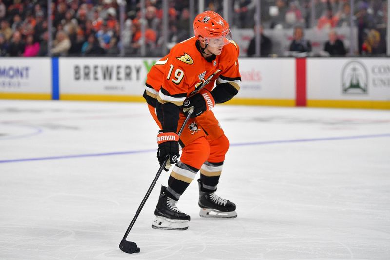 Oct 14, 2025; Anaheim, California, USA; Anaheim Ducks right wing Troy Terry (19) moves in for a shot against the Pittsburgh Penguins during the second period at Honda Center. Mandatory Credit: Gary A. Vasquez-Imagn Images