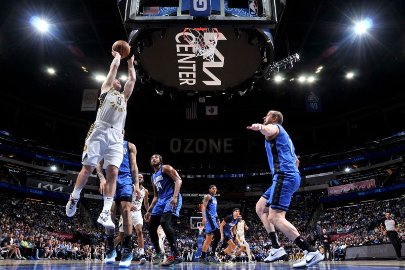 ORLANDO, FL - MARCH 10: T.J. McConnell #9 of the Indiana Pacers goes to the basket during the game on March 10, 2024 at Amway Center in Orlando, Florida. NOTE TO USER: User expressly acknowledges and agrees that, by downloading and or using this photograph, User is consenting to the terms and conditions of the Getty Images License Agreement. Mandatory Copyright Notice: Copyright 2024 NBAE (Photo by Fernando Medina/NBAE via Getty Images)