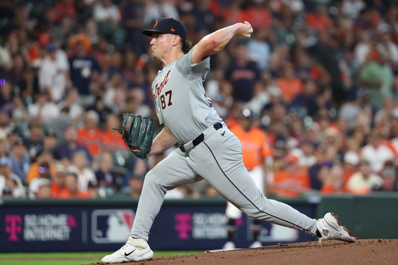 Oct 2, 2024; Houston, Texas, USA; Detroit Tigers pitcher Tyler Holton (87) throws against the Houston Astros during the first inning of game two of the Wildcard round for the 2024 MLB Playoffs at Minute Maid Park. Mandatory Credit: Thomas Shea-Imagn Images