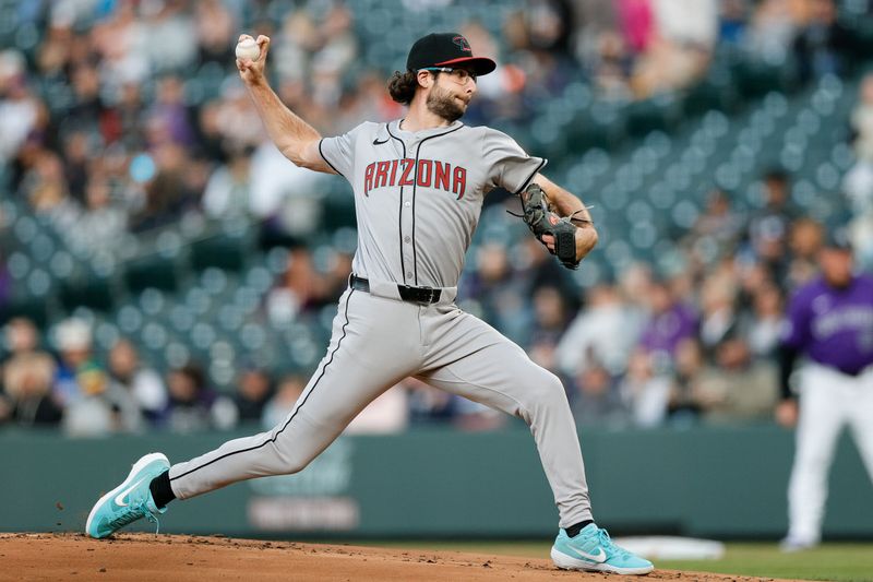 Apr 8, 2024; Denver, Colorado, USA; Arizona Diamondbacks starting pitcher Zac Gallen (23) pitches in the first inning against the Colorado Rockies at Coors Field. Mandatory Credit: Isaiah J. Downing-USA TODAY Sports