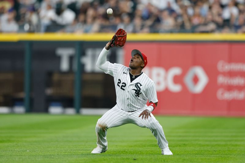 Jul 4, 2023; Chicago, Illinois, USA; Chicago White Sox right fielder Oscar Colas (22) catches a fly ball hit by Toronto Blue Jays third baseman Matt Chapman during the sixth inning at Guaranteed Rate Field. Mandatory Credit: Kamil Krzaczynski-USA TODAY Sports