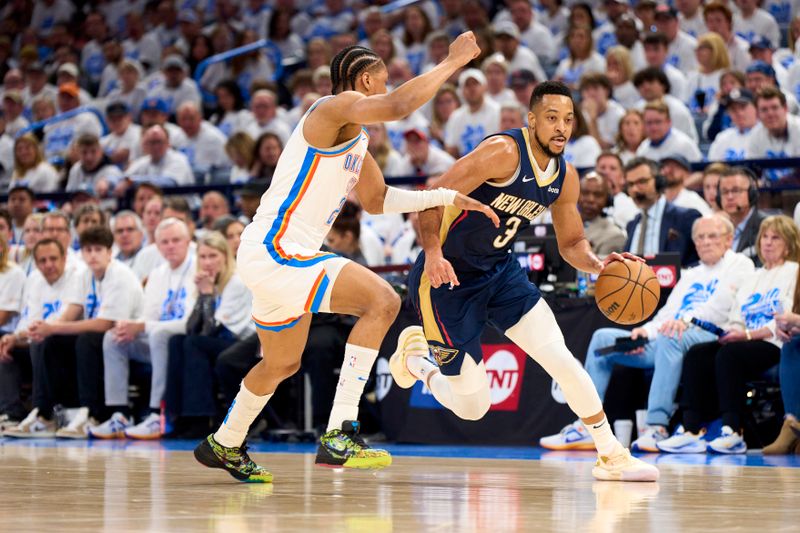 OKLAHOMA CITY, OKLAHOMA - APRIL 21: CJ McCollum #3 of the New Orleans Pelicans brings the ball up court against the Oklahoma City Thunder in game one of the Western Conference First Round Playoffs at the Paycom Center on April 21, 2024 in Oklahoma City, Oklahoma. NOTE TO USER: User expressly acknowledges and agrees that, by downloading and or using this photograph, User is consenting to the terms and conditions of the Getty Images License Agreement.  (Photo by Cooper Neill/Getty Images)