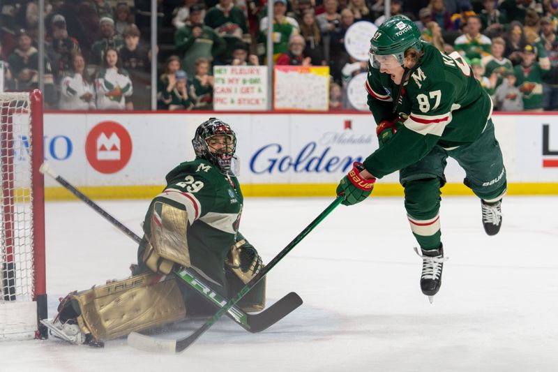 Apr 8, 2023; Saint Paul, Minnesota, USA; Minnesota Wild goaltender Marc-Andre Fleury (29) makes a save on Minnesota Wild left wing Kirill Kaprizov (97), who is back from injury, in warmups. at Xcel Energy Center. Mandatory Credit: Matt Blewett-USA TODAY Sports