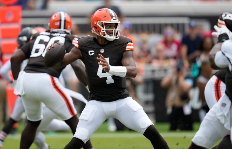 Cleveland Browns quarterback Deshaun Watson (4) throws a pass against the Jacksonville Jaguars during the first half of an NFL football game Sunday, Sept. 15, 2024, in Jacksonville, Fla. (AP Photo/John Raoux)