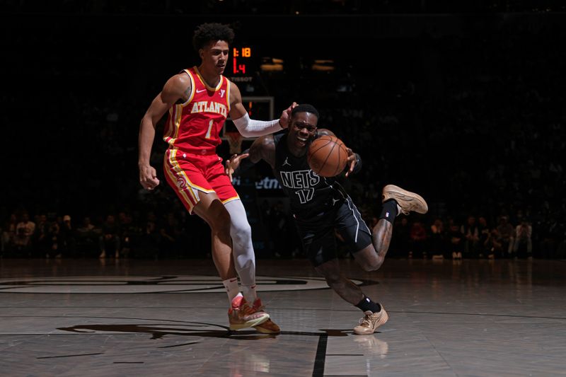 BROOKLYN, NY - FEBRUARY 29: Dennis Schroder #17 of the Brooklyn Nets dribbles the ball during the game against the Atlanta Hawks on February 29, 2024 at Barclays Center in Brooklyn, New York. NOTE TO USER: User expressly acknowledges and agrees that, by downloading and or using this Photograph, user is consenting to the terms and conditions of the Getty Images License Agreement. Mandatory Copyright Notice: Copyright 2024 NBAE (Photo by Jesse D. Garrabrant/NBAE via Getty Images)