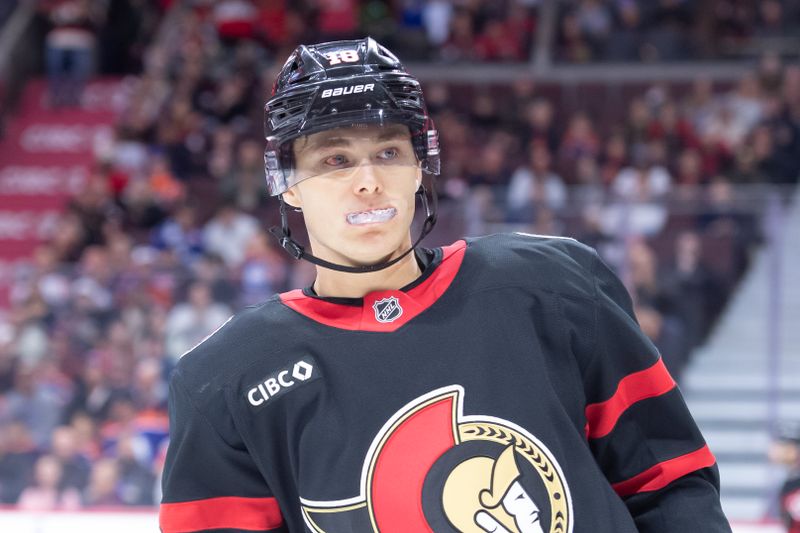 Nov 19, 2024; Ottawa, Ontario, CAN; Ottawa Senators center Tim Stutzle (18) skates in the first period against the Edmonton Oilers at the Canadian Tire Centre. Mandatory Credit: Marc DesRosiers-Imagn Images