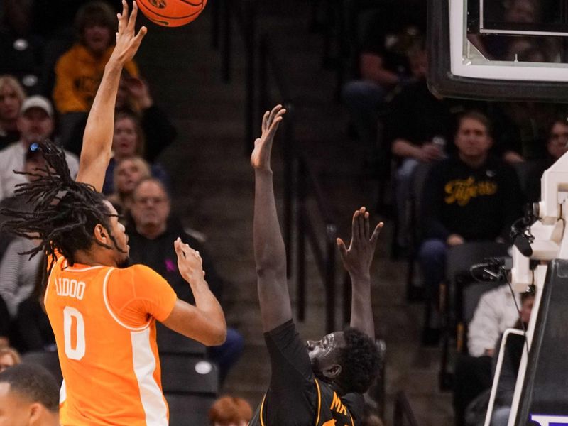 Feb 20, 2024; Columbia, Missouri, USA; Tennessee Volunteers forward Jonas Aidoo (0) shoots over Missouri Tigers center Mabor Majak (45) during the first half at Mizzou Arena. Mandatory Credit: Denny Medley-USA TODAY Sports