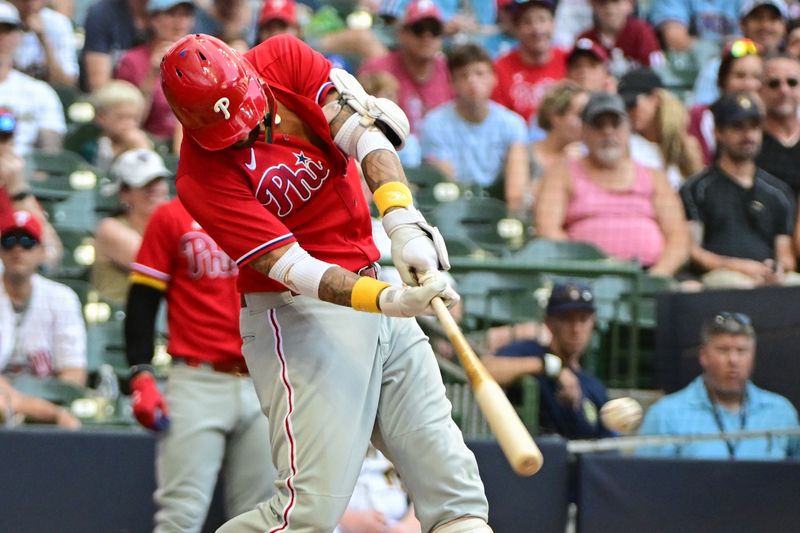 Sep 3, 2023; Milwaukee, Wisconsin, USA; Philadelphia Phillies right fielder Nick Castellanos (8) hits a double to drive in a run in the sixth inning against the Milwaukee Brewers at American Family Field. Mandatory Credit: Benny Sieu-USA TODAY Sports