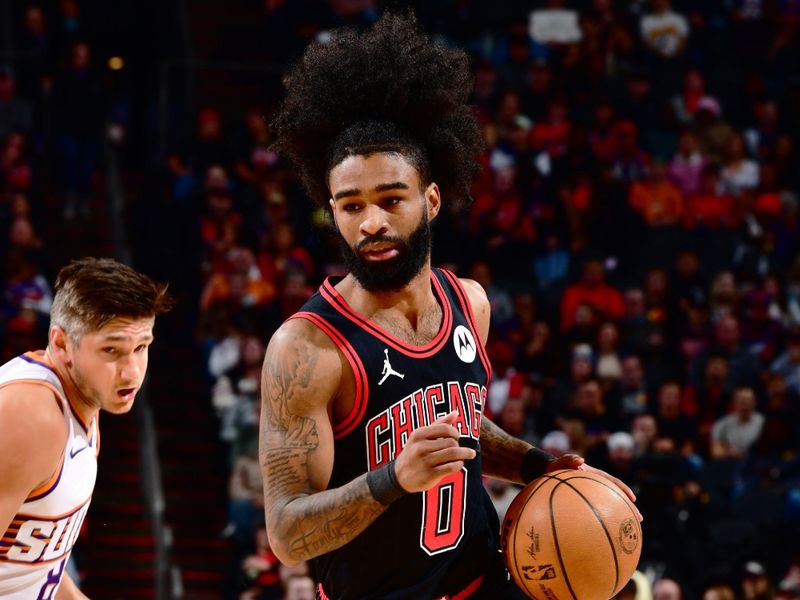 PHOENIX, AZ - JANUARY 22:  Coby White #0 of the Chicago Bulls dribbles the ball during the game against the Phoenix Suns on January 22, 2024 at Footprint Center in Phoenix, Arizona. NOTE TO USER: User expressly acknowledges and agrees that, by downloading and or using this photograph, user is consenting to the terms and conditions of the Getty Images License Agreement. Mandatory Copyright Notice: Copyright 2024 NBAE (Photo by Barry Gossage/NBAE via Getty Images)