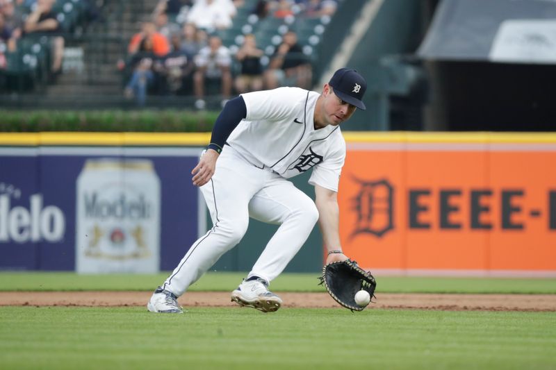 Jun 9, 2023; Detroit, Michigan, USA; Detroit Tigers infielder Spencer Torkelson (20) fields a ground ball during the gamer against the Arizona Diamondbacks at Comerica Park. Mandatory Credit: Brian Bradshaw Sevald-USA TODAY Sports