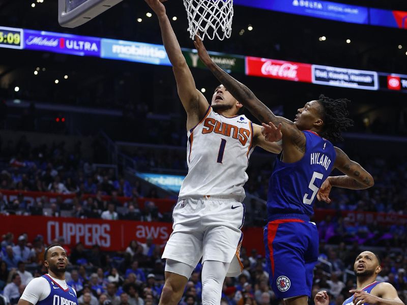 LOS ANGELES, CALIFORNIA - APRIL 20:   Devin Booker #1 of the Phoenix Suns takes a shot against Bones Hyland #5 of the LA Clippers in the second half of Game Three of the Western Conference First Round Playoffs at Crypto.com Arena on April 20, 2023 in Los Angeles, California.  NOTE TO USER: User expressly acknowledges and agrees that, by downloading and/or using this photograph, user is consenting to the terms and conditions of the Getty Images License Agreement.  (Photo by Ronald Martinez/Getty Images)