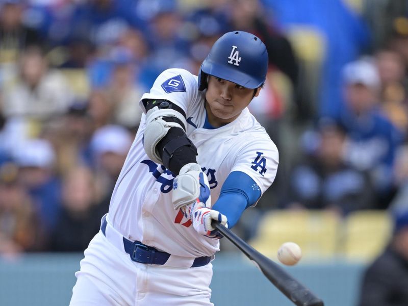 Apr 14, 2024; Los Angeles, California, USA; Los Angeles Dodgers designated hitter Shohei Ohtani (17) flies out in the first inning against the San Diego Padres at Dodger Stadium. Mandatory Credit: Jayne Kamin-Oncea-USA TODAY Sports