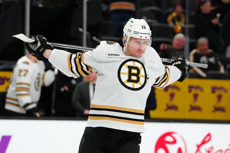 Jan 11, 2024; Las Vegas, Nevada, USA; Boston Bruins center Charlie Coyle (13) warms up before a game against the Vegas Golden Knights at T-Mobile Arena. Mandatory Credit: Stephen R. Sylvanie-USA TODAY Sports