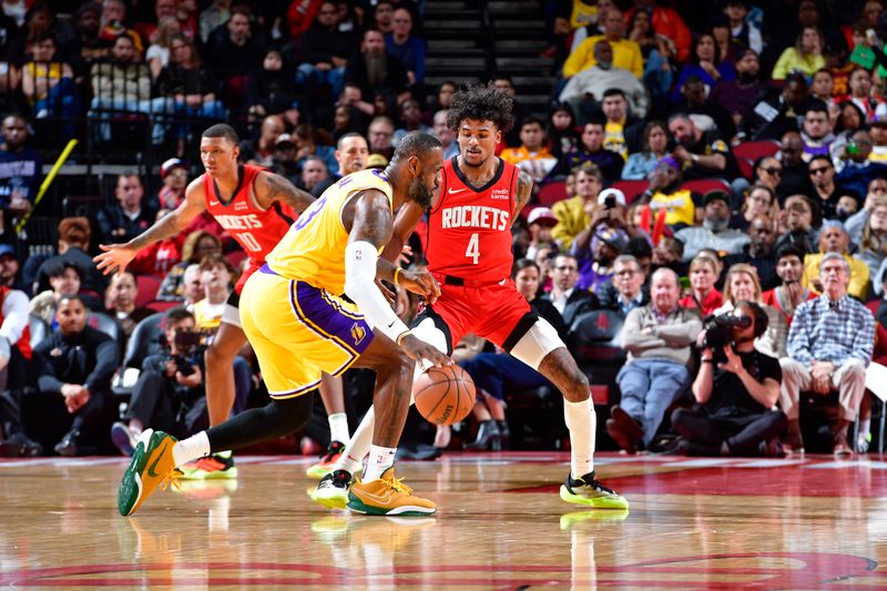 HOUSTON, TX - JANUARY 29: Jalen Green #4 of the Houston Rockets plays defense during the game against the Los Angeles Lakers  on January 29, 2024 at the Toyota Center in Houston, Texas. NOTE TO USER: User expressly acknowledges and agrees that, by downloading and or using this photograph, User is consenting to the terms and conditions of the Getty Images License Agreement. Mandatory Copyright Notice: Copyright 2024 NBAE (Photo by Logan Riely/NBAE via Getty Images)