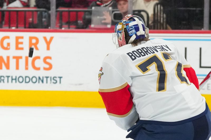 Jan 16, 2026; Raleigh, North Carolina, USA;  Florida Panthers goaltender Sergei Bobrovsky (72) stops the shot against the Carolina Hurricanes during the first period at Lenovo Center. Mandatory Credit: James Guillory-Imagn Images