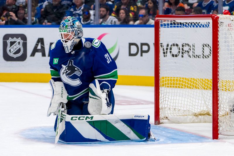 May 20, 2024; Vancouver, British Columbia, CAN; Vancouver Canucks goalie Arturs Silvos (31) makes a save against the Edmonton Oilers during the second period in game seven of the second round of the 2024 Stanley Cup Playoffs at Rogers Arena. Mandatory Credit: Bob Frid-USA TODAY Sports