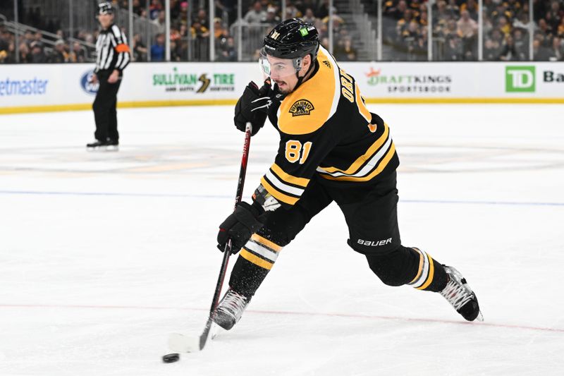 Mar 9, 2023; Boston, Massachusetts, USA; Boston Bruins defenseman Dmitry Orlov (81) takes a shot against the Edmonton Oilers during the third period at the TD Garden. Mandatory Credit: Brian Fluharty-USA TODAY Sports