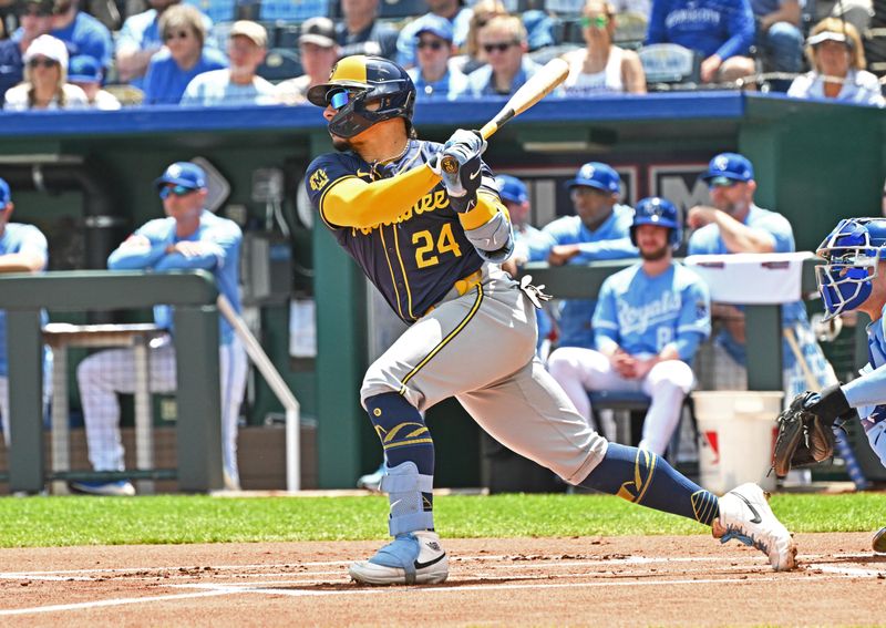 May 8, 2024; Kansas City, Missouri, USA;  Milwaukee Brewers catcher William Contreras (24) hits an RBI double in the first inning against the Kansas City Royals at Kauffman Stadium. Mandatory Credit: Peter Aiken-USA TODAY Sports