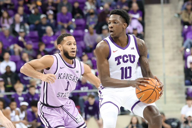 Jan 14, 2023; Fort Worth, Texas, USA;  TCU Horned Frogs guard Damion Baugh (10) dribbles as Kansas State Wildcats guard Markquis Nowell (1) defends during the first half at Ed and Rae Schollmaier Arena. Mandatory Credit: Kevin Jairaj-USA TODAY Sports