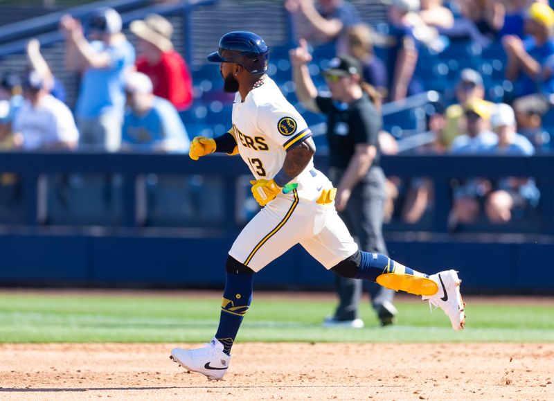 Feb 27, 2026; Phoenix, Arizona, USA; Milwaukee Brewers infielder Luis Rengifo rounds the bases after hitting a home run against the Chicago White Sox during a spring training game at American Family Fields of Phoenix. Mandatory Credit: Mark J. Rebilas-Imagn Images