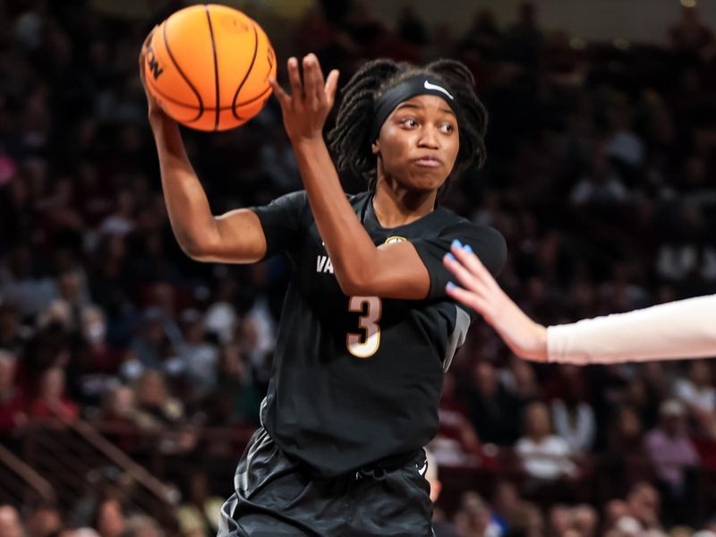 Jan 28, 2024; Columbia, South Carolina, USA; Vanderbilt Commodores guard Jordyn Cambridge (3) passes around South Carolina Gamecocks forward Chloe Kitts (21) in the second half at Colonial Life Arena. Mandatory Credit: Jeff Blake-USA TODAY Sports