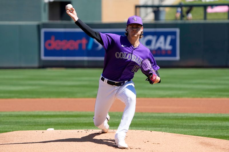 Mar 21, 2024; Salt River Pima-Maricopa, Arizona, USA; Colorado Rockies starting pitcher Ryan Feltner (18) pitches against the Chicago Cubs in the first inning at Salt River Fields at Talking Stick. Mandatory Credit: Rick Scuteri-USA TODAY Sports
