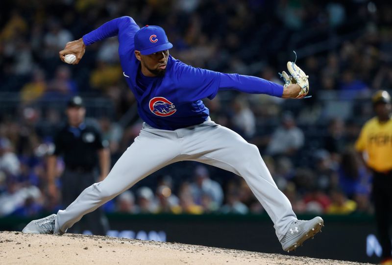 Aug 25, 2023; Pittsburgh, Pennsylvania, USA; Chicago Cubs relief pitcher Jose Cuas (74) pitches against the Pittsburgh Pirates during the seventh inning at PNC Park. Pittsburgh won 2-1. Mandatory Credit: Charles LeClaire-USA TODAY Sports