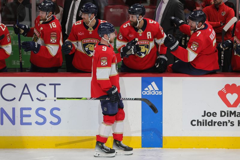 Feb 27, 2024; Sunrise, Florida, USA; Florida Panthers center Sam Bennett (9) celebrates with teammates after scoring against the Buffalo Sabres during the first period at Amerant Bank Arena. Mandatory Credit: Sam Navarro-USA TODAY Sports