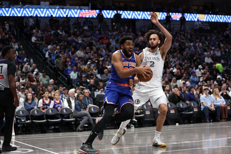 DALLAS, TX - NOVEMBER 27: Karl-Anthony Towns #32 of the New York Knicks drives to the basket during the game against the Dallas Mavericks  during a regular season game on November 27, 2024 at dalAmerican Airlines Center in Dallas, Texas. NOTE TO USER: User expressly acknowledges and agrees that, by downloading and or using this photograph, User is consenting to the terms and conditions of the Getty Images License Agreement. Mandatory Copyright Notice: Copyright 2024 NBAE (Photo by Tim Heitman/NBAE via Getty Images)