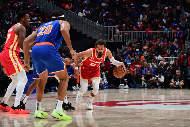 ATLANTA, GA - NOVEMBER 6:  Trae Young #11 of the Atlanta Hawks dribbles the ball during the game against the New York Knicks during a regular season game on November 6, 2024 at State Farm Arena in Atlanta, Georgia.  NOTE TO USER: User expressly acknowledges and agrees that, by downloading and/or using this Photograph, user is consenting to the terms and conditions of the Getty Images License Agreement. Mandatory Copyright Notice: Copyright 2024 NBAE (Photo by Scott Cunningham/NBAE via Getty Images)