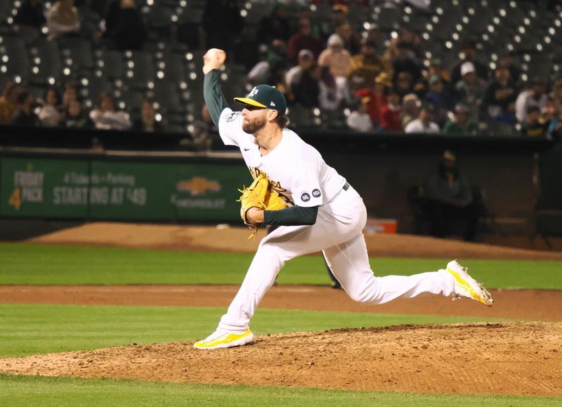 Sep 22, 2023; Oakland, California, USA; Oakland Athletics relief pitcher Zach Neal (31) pitches the ball against the Detroit Tigers during the ninth inning at Oakland-Alameda County Coliseum. Mandatory Credit: Kelley L Cox-USA TODAY Sports