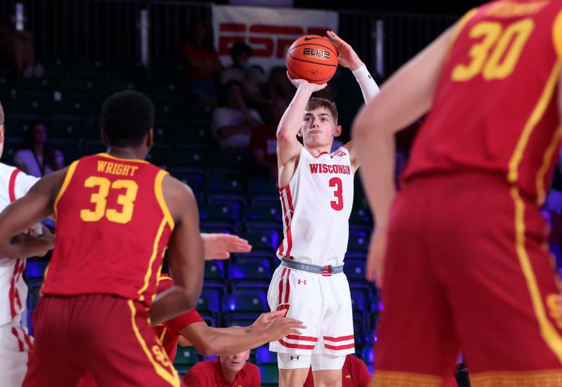 Nov 25, 2022; Paradise Island, BAHAMAS; Wisconsin Badgers guard Connor Essegian (3) shoots during the first half against the USC Trojans at Imperial Arena. Mandatory Credit: Kevin Jairaj-USA TODAY Sports