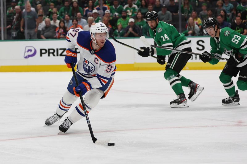 Oct 19, 2024; Dallas, Texas, USA; Edmonton Oilers center Connor McDavid (97) controls the puck against the Dallas Stars in the first period at American Airlines Center. Mandatory Credit: Tim Heitman-Imagn Images