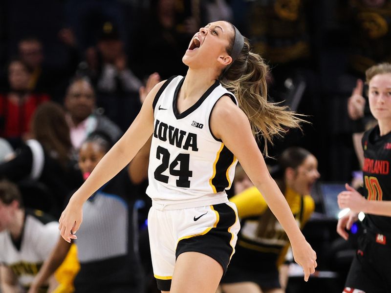 Mar 4, 2023; Minneapolis, MINN, USA; Iowa Hawkeyes guard Gabbie Marshall (24) reacts to her shot against the Maryland Terrapins during the second half at Target Center. Mandatory Credit: Matt Krohn-USA TODAY Sports