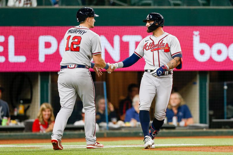 May 15, 2023; Arlington, Texas, USA; Atlanta Braves left fielder Kevin Pillar (17) is congratulated by catcher Sean Murphy (12) after hitting a two-run home run during the second inning against the Texas Rangers at Globe Life Field. Mandatory Credit: Andrew Dieb-USA TODAY Sports