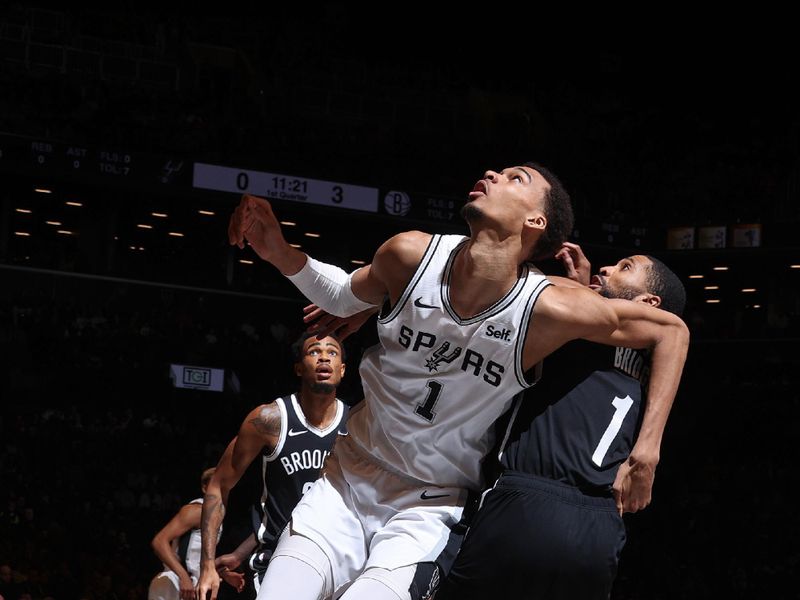 BROOKLYN, NY - FEBRUARY 10: Victor Wembanyama #1 of the San Antonio Spurs boxes out during the game against the Brooklyn Nets on February 10, 2024 at Barclays Center in Brooklyn, New York. NOTE TO USER: User expressly acknowledges and agrees that, by downloading and or using this Photograph, user is consenting to the terms and conditions of the Getty Images License Agreement. Mandatory Copyright Notice: Copyright 2024 NBAE (Photo by Nathaniel S. Butler/NBAE via Getty Images)