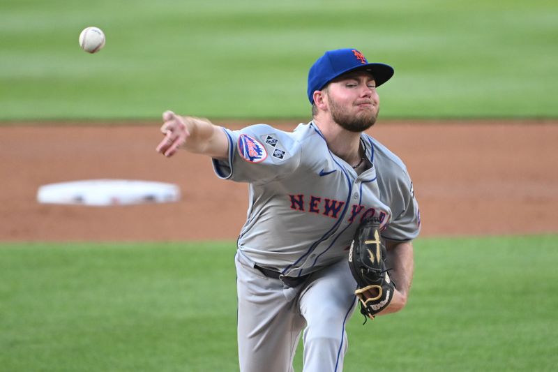 Jul 3, 2024; Washington, District of Columbia, USA; New York Mets starting pitcher Christian Scott (45) throws a pitch against the Washington Nationals during the during the second inning at Nationals Park. Mandatory Credit: Rafael Suanes-USA TODAY Sports