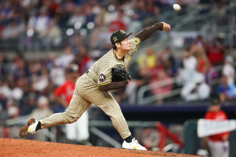 May 17, 2024; Atlanta, Georgia, USA; San Diego Padres relief pitcher Yuki Matsui (1) throws against the Atlanta Braves in the seventh inning at Truist Park. Mandatory Credit: Brett Davis-USA TODAY Sports