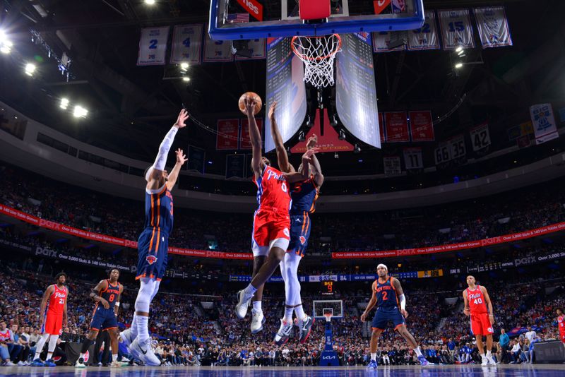 PHILADELPHIA, PA - APRIL 28: Tyrese Maxey #0 of the Philadelphia 76ers drives to the basket during the game against the New York Knicks during Round 1 Game 4 of the 2024 NBA Playoffs on April 28, 2024 at the Wells Fargo Center in Philadelphia, Pennsylvania NOTE TO USER: User expressly acknowledges and agrees that, by downloading and/or using this Photograph, user is consenting to the terms and conditions of the Getty Images License Agreement. Mandatory Copyright Notice: Copyright 2024 NBAE (Photo by Jesse D. Garrabrant/NBAE via Getty Images)