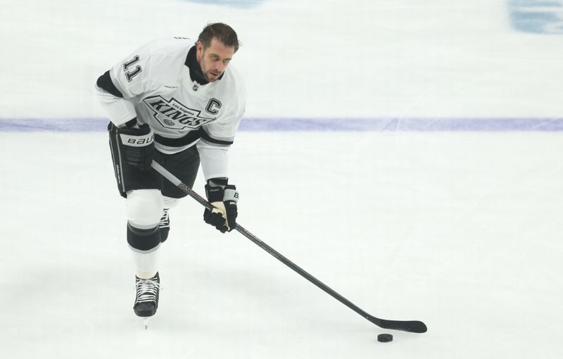 Nov 9, 2025; Pittsburgh, Pennsylvania, USA;  Los Angeles Kings center Anze Kopitar (11) warms up before the game against the Pittsburgh Penguins at PPG Paints Arena. Mandatory Credit: Charles LeClaire-Imagn Images